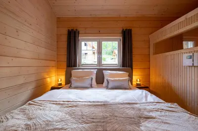 Ein Bett oder Betten in einem Zimmer der Unterkunft Bergwaldsuites