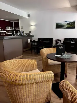 Ein Sitzbereich in der Unterkunft Landhotel Harz