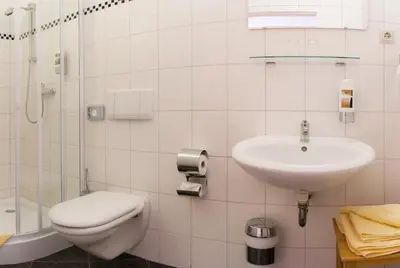 Ein Badezimmer in der Unterkunft Landhotel Harz