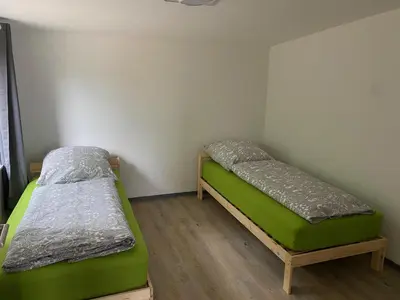 Ein Bett oder Betten in einem Zimmer der Unterkunft Großer Vampir