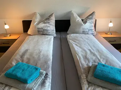 Ein Bett oder Betten in einem Zimmer der Unterkunft Urlaub in der Welterbestadt Quedlinburg