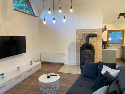 TV/Unterhaltungsangebot in der Unterkunft Lodge am Wald Terrasse Garten Grill ruhige Lage Wandern