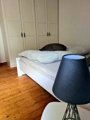 Ein Bett oder Betten in einem Zimmer der Unterkunft GP Ferienwohnung