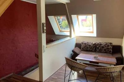 Ein Sitzbereich in der Unterkunft Ferienhaus Ackerbürgerhof in der Welterbestadt Quedlinburg