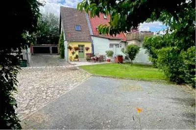 Ein Garten an der Unterkunft Ferienhaus Ackerbürgerhof in der Welterbestadt Quedlinburg