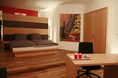 Ein Bett oder Betten in einem Zimmer der Unterkunft Hotel Der Achtermann