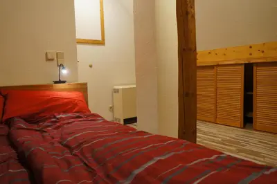 Ein Bett oder Betten in einem Zimmer der Unterkunft Ferienwohnung Zündholz