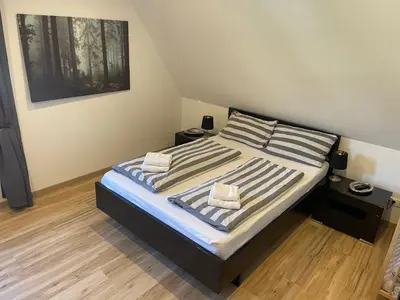 Ein Bett oder Betten in einem Zimmer der Unterkunft Ferienwohnung Arnold