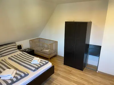Ein Bett oder Betten in einem Zimmer der Unterkunft Ferienwohnung Arnold