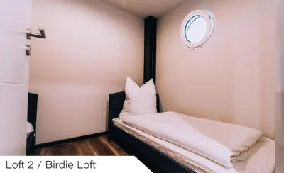 Ein Bett oder Betten in einem Zimmer der Unterkunft Events and Stay