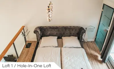 Ein Bett oder Betten in einem Zimmer der Unterkunft Events and Stay