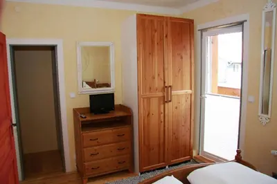 Ein Bett oder Betten in einem Zimmer der Unterkunft Gästehaus Franz