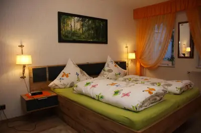 Ein Bett oder Betten in einem Zimmer der Unterkunft Harz-Sonne 2