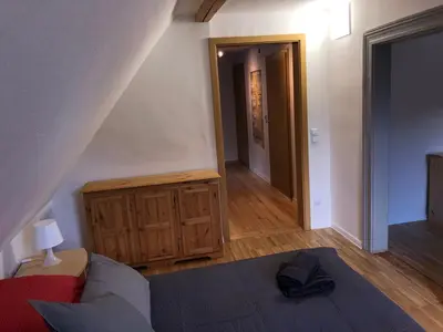 Ein Bett oder Betten in einem Zimmer der Unterkunft Ferienhaus Art Apartment - Harz