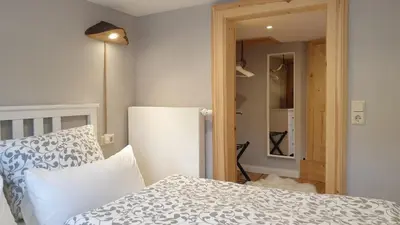 Ein Bett oder Betten in einem Zimmer der Unterkunft Ferienhaus Tor zum Münzenberg