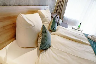 Ein Bett oder Betten in einem Zimmer der Unterkunft Haus am See Luxury HS 228 B