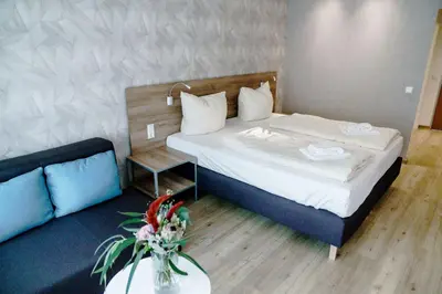 Ein Bett oder Betten in einem Zimmer der Unterkunft Haus am See Luxury HS 223 B