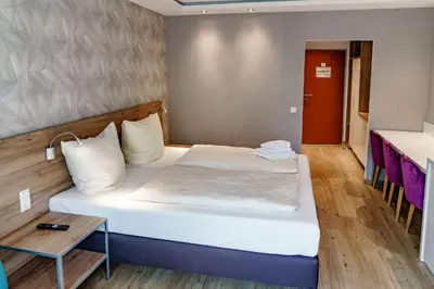 Ein Bett oder Betten in einem Zimmer der Unterkunft Haus am See Luxury HS 224 B