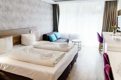 Ein Bett oder Betten in einem Zimmer der Unterkunft Haus am See Luxury HS 225 B