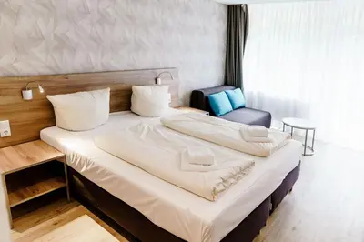 Ein Bett oder Betten in einem Zimmer der Unterkunft Haus am See Luxury HS 225 B