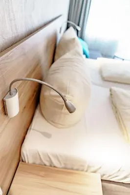 Ein Bett oder Betten in einem Zimmer der Unterkunft Haus am See Luxury HS 226 B