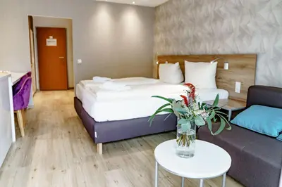 Ein Bett oder Betten in einem Zimmer der Unterkunft Haus am See Luxury HS 226 B