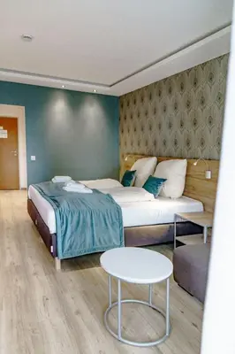 Ein Bett oder Betten in einem Zimmer der Unterkunft Haus am See HS 232