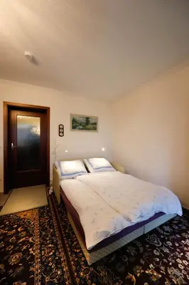 Ein Bett oder Betten in einem Zimmer der Unterkunft Ferienwohnung Momo