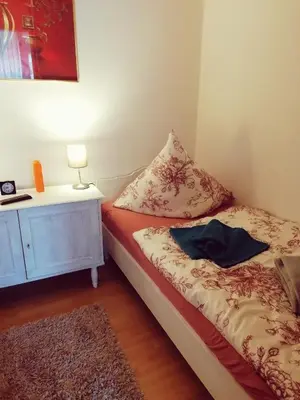 Ein Bett oder Betten in einem Zimmer der Unterkunft CrisAnd 2 Bergen