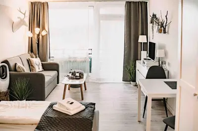 Ein Sitzbereich in der Unterkunft Haus am See Harzflair