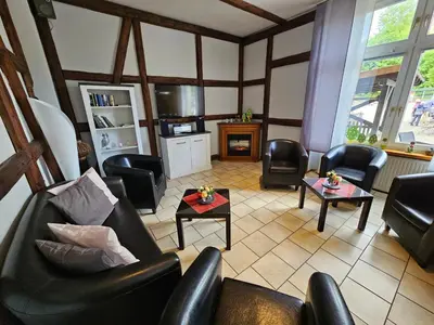 Ein Sitzbereich in der Unterkunft Ferienhotel Forelle Thale Ortsteil Treseburg