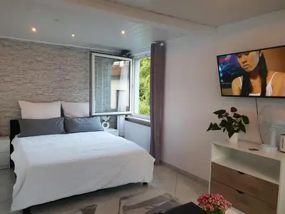 Ein Bett oder Betten in einem Zimmer der Unterkunft FeWo im Harz