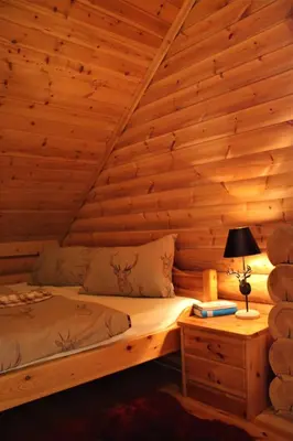 Ein Bett oder Betten in einem Zimmer der Unterkunft Chalet mit Schlossblick Wernigerode, Chalet 2