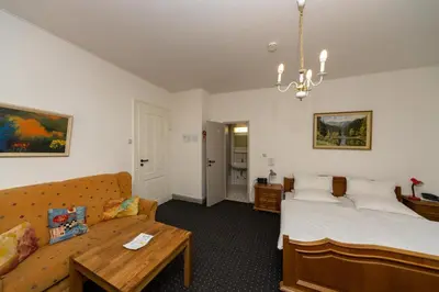 Ein Bett oder Betten in einem Zimmer der Unterkunft Hotel Villa Feise - Direkt in der Innenstadt-Fußgängerzone-