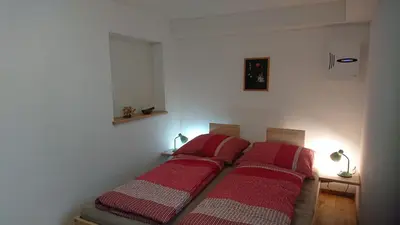 Ein Bett oder Betten in einem Zimmer der Unterkunft Ferienwohnung Wäldle