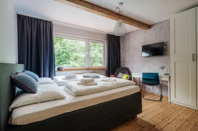 Ein Bett oder Betten in einem Zimmer der Unterkunft Ferienhaus Fingerhut