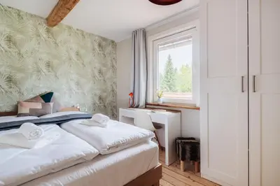 Ein Bett oder Betten in einem Zimmer der Unterkunft Ferienhaus Fingerhut
