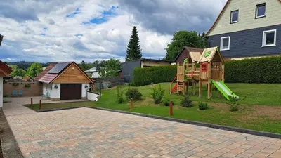 Ein Garten an der Unterkunft Ferienhaus Fingerhut
