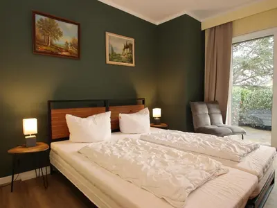 Ein Bett oder Betten in einem Zimmer der Unterkunft Ferienwohnung mit weitem Ausblick in Altenau