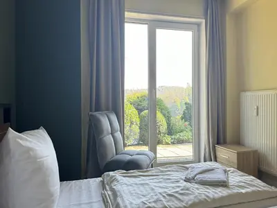 Ein Bett oder Betten in einem Zimmer der Unterkunft Ferienwohnung mit weitem Ausblick in Altenau