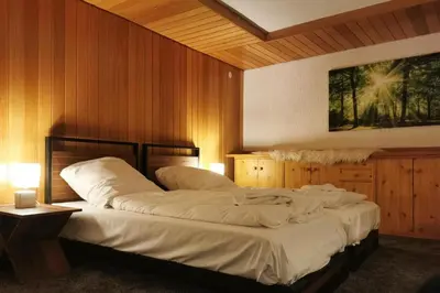 Ein Bett oder Betten in einem Zimmer der Unterkunft Ferienwohnung mit weitem Ausblick in Altenau