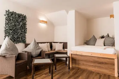 Ein Bett oder Betten in einem Zimmer der Unterkunft Parkhotel Weber-Müller