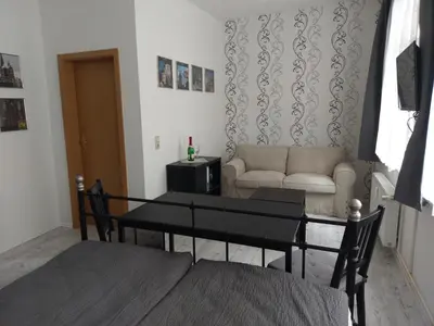 Ein Sitzbereich in der Unterkunft Fewo Kaplanei
