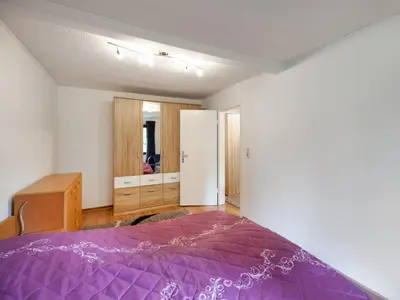 Ein Bett oder Betten in einem Zimmer der Unterkunft Ferienwohnung in Benneckenstein