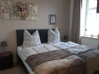 Ein Bett oder Betten in einem Zimmer der Unterkunft An der Stadtmauer