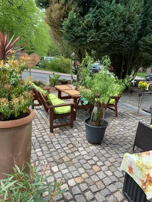 Ein Garten an der Unterkunft Hotel-Pension Teutonia