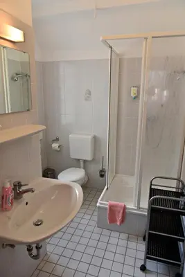 Ein Badezimmer in der Unterkunft Hotel-Pension Teutonia