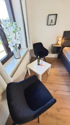 Ein Sitzbereich in der Unterkunft Hotel Schneiderhof