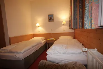 Ein Bett oder Betten in einem Zimmer der Unterkunft Pension Barbara