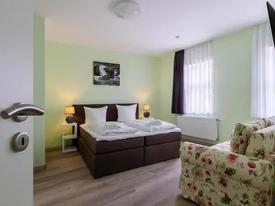 Ein Bett oder Betten in einem Zimmer der Unterkunft Apartment Schlossblick, Wernigerode
